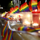 A woman lights a candle during a candlelight vigil for the victims of the Pulse Nightclub shooting in Orlando, Florida, on June 13, 2016, in Sydney, Australia.
Daniel Munoz/Getty Images